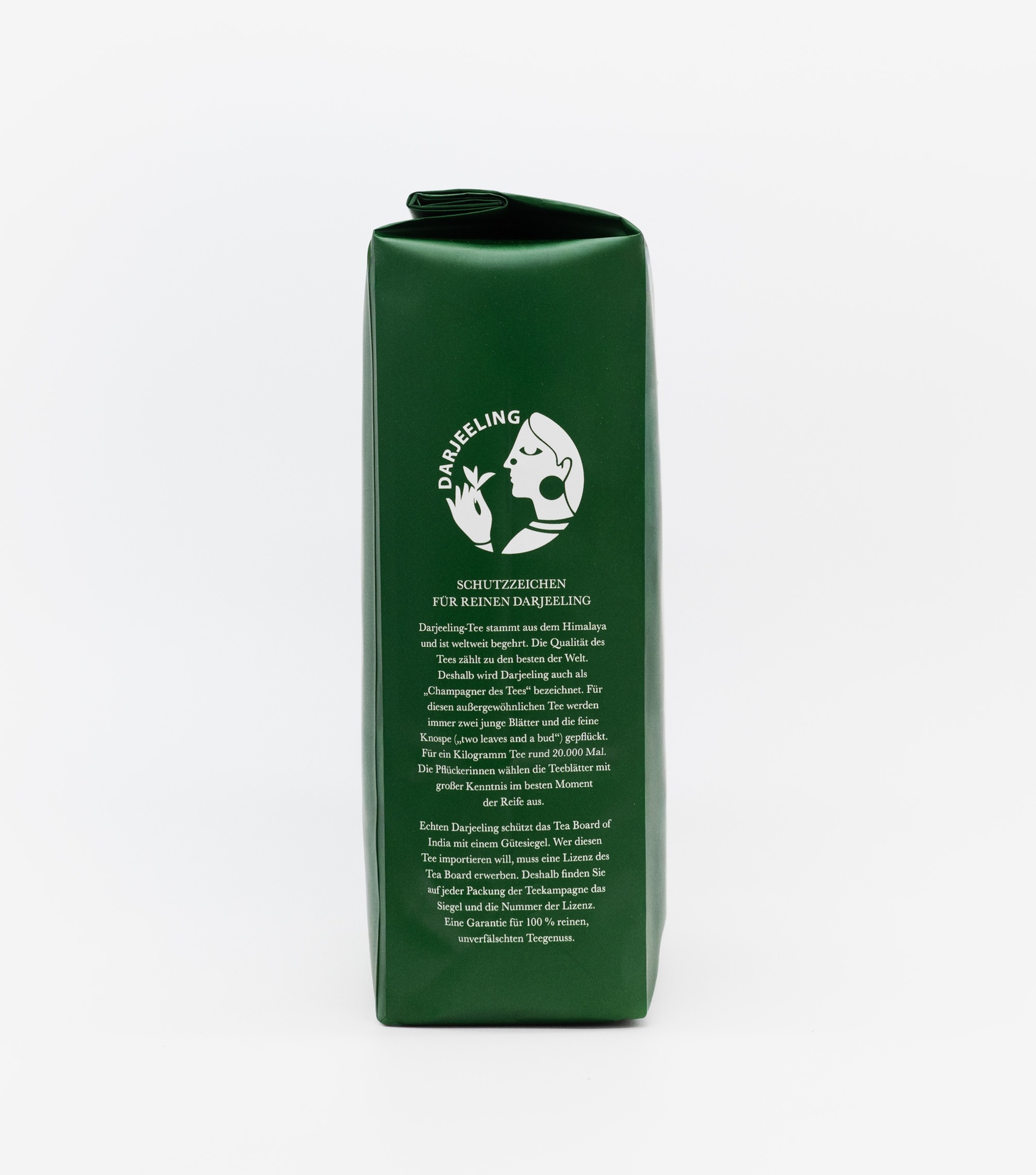 Rückseite einer Teekampagne-Packung mit Informationen zu Herkunft und Qualität